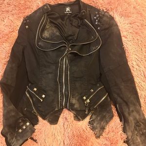 Studded zip up rocker jacket.
